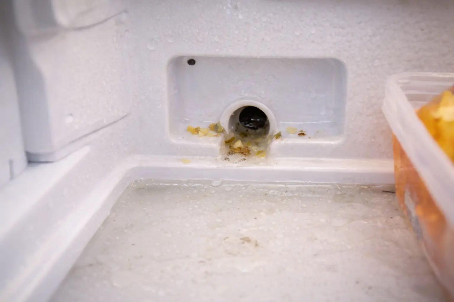 clogged defrost drain channel